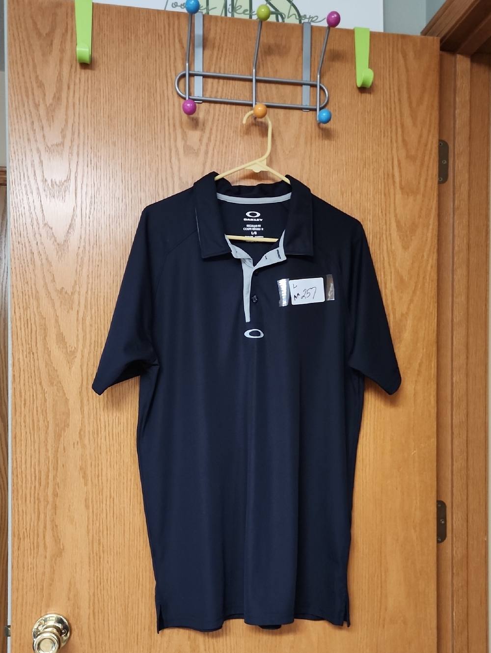 Oakley Men's Dark black Polo with Light Gray Placket L number 257